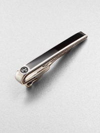 A timeless sartorial standard in smooth sterling silver with black onyx inlay.Sterling silverBlack onyxAbout 2 longImported A timeless sartorial standard in smooth sterling silver with black onyx inlay.Sterling silverBlack onyxAbout 2 longImported