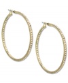 You can't go wrong with hoops! These Jones New York earrings flaunt a large design embellished with crystal glass accents. Crafted in worn gold tone mixed metal. Approximate diameter: 1-3/4 inches.