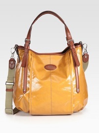 Beautifully crafted coated canvas and luxurious leather accents with a roomy interior.Double adjustable top handles, 5-9 dropDetachable adjustable shoulder strap, 15-22 dropSnap button closureProtective metal feetOne inside zip pocketOne inside open pocketFully lined12½W X 10H X 9½DMade in Italy Beautifully crafted coated canvas and luxurious leather accents with a roomy interior.Double adjustable top handles, 5-9 dropDetachable adjustable shoulder strap, 15-22 dropSnap button closureProtective metal feetOne inside zip pocketOne inside open pocketFully lined12½W X 10H X 9½DMade in Italy