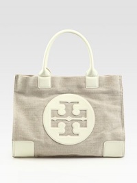 Durable canvas in a roomy top-handle carryall finished with rich leather trim.Double top handles, 7¼ dropTop snap closureOne inside zip pocketTwo inside open pocketsCanvas lining17W X 13½H X 4½DImported Durable canvas in a roomy top-handle carryall finished with rich leather trim.Double top handles, 7¼ dropTop snap closureOne inside zip pocketTwo inside open pocketsCanvas lining17W X 13½H X 4½DImported