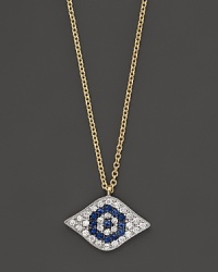 Diamonds and blue sapphires in 14K. yellow gold from a dazzling evil eye necklace. By Meira T. Diamonds and blue sapphires in 14K. yellow gold from a dazzling evil eye necklace. By Meira T.