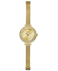 Always elegant, this slender timepiece by GUESS finishes your complete look. Always elegant, this slender timepiece by GUESS finishes your complete look.