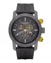 This Burberry timepiece features a gray rubber strap and round stainless steel case. Textured, gray chronograph dial with stick indices, date window at four o'clock, three subdials, logo and white and yellow accents. Quartz movement. Water resistant to 100 meters. Two-year limited warranty. This Burberry timepiece features a gray rubber strap and round stainless steel case. Textured, gray chronograph dial with stick indices, date window at four o'clock, three subdials, logo and white and yellow accents. Quartz movement. Water resistant to 100 meters. Two-year limited warranty.