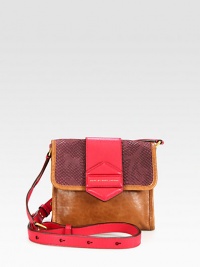 A modern and chic style in supple leather accented with python embossed suede in a fun colorblock design.Adjustable leather shoulder strap, 16½-20 dropMagnetic snap flap closureOne inside zip pocketTwo inside open pocketsFully lined8W X 7H X 2DImported A modern and chic style in supple leather accented with python embossed suede in a fun colorblock design.Adjustable leather shoulder strap, 16½-20 dropMagnetic snap flap closureOne inside zip pocketTwo inside open pocketsFully lined8W X 7H X 2DImported