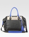 The perfect carryall in beautiful, pebbled leather with a colorblock design and animal-printed leather accent.Double top handles, 5.5 dropAdjustable shoulder strap, 15.5 to 17.5 dropTop zip closureOne inside zip pocketThree inside open pocketsFully lined13W X 11H X 5.75DImported