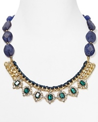 Sparkling, emerald-hued stones make an appearance against golden chains and woven thread on Lydell NYC's faceted, beaded necklace. Sparkling, emerald-hued stones make an appearance against golden chains and woven thread on Lydell NYC's faceted, beaded necklace.