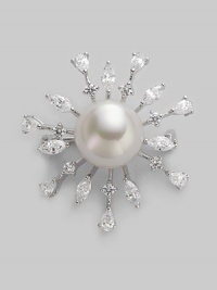 A shiny starburst with lustrous pearl center radiates with glimmering rhinestone rays. 14mm round white pearl Cubic zirconia Sterling silver Diameter, about 1½ Pin backing Made in Spain A shiny starburst with lustrous pearl center radiates with glimmering rhinestone rays. 14mm round white pearl Cubic zirconia Sterling silver Diameter, about 1½ Pin backing Made in Spain