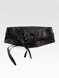 A timeless, pleated piece made from fascinatingly soft leather.About 5 wideLamb leatherImported A timeless, pleated piece made from fascinatingly soft leather.About 5 wideLamb leatherImported