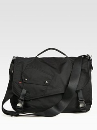 A traditional messenger with downtown edge, features a removable crossbody strap, ample pockets and additional padding for your computer devices.Flap, buckle closureTop handleAdjustable shoulder strapExterior, interior pocketsNylon18W x 11H x 5DImported A traditional messenger with downtown edge, features a removable crossbody strap, ample pockets and additional padding for your computer devices.Flap, buckle closureTop handleAdjustable shoulder strapExterior, interior pocketsNylon18W x 11H x 5DImported