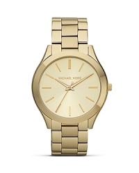 Get a fresh face with this gold tone watch from MICHAEL Michael Kors. It's three-hand movement is ever-practical while it's superfine dial and gold indexes lend this piece a distinctive look. Get a fresh face with this gold tone watch from MICHAEL Michael Kors. It's three-hand movement is ever-practical while it's superfine dial and gold indexes lend this piece a distinctive look.