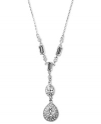 Exude 1950s era elegance in this vintage-inspired classic by Givenchy. Y-shaped pendant features round-cut and rectangular crystals set in silver tone mixed metal. Approximate length: 15 inches. Exude 1950s era elegance in this vintage-inspired classic by Givenchy. Y-shaped pendant features round-cut and rectangular crystals set in silver tone mixed metal. Approximate length: 15 inches.