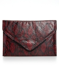 Show some skin with this exotic envelope clutch from BCBGeneration that adds something chic to your evening out. Python print plays elegantly against the slim silhouette that stows keys, cards, cash and ID. Show some skin with this exotic envelope clutch from BCBGeneration that adds something chic to your evening out. Python print plays elegantly against the slim silhouette that stows keys, cards, cash and ID.