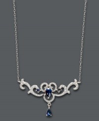 Accent your evening wear with elegance. This ornate pendant by Victoria Townsend features pear-cut sapphires (9/10 ct. t.w.) and diamond accents in a sterling silver filigree setting. Approximate length: 17 inches. Approximate pendant length: 3/4 inch. Approximate pendant width: 1-1/2 inches. Accent your evening wear with elegance. This ornate pendant by Victoria Townsend features pear-cut sapphires (9/10 ct. t.w.) and diamond accents in a sterling silver filigree setting. Approximate length: 17 inches. Approximate pendant length: 3/4 inch. Approximate pendant width: 1-1/2 inches.