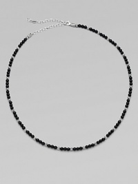 A single strand of black onyx beads and sterling silver stations makes a modern statement.Sterling silverOnyxAbout 19½ long with 4½ extenderLobster claspImported A single strand of black onyx beads and sterling silver stations makes a modern statement.Sterling silverOnyxAbout 19½ long with 4½ extenderLobster claspImported