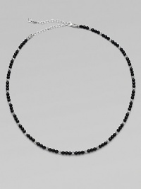 A single strand of black onyx beads and sterling silver stations makes a modern statement.Sterling silverOnyxAbout 19½ long with 4½ extenderLobster claspImported