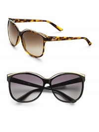 Retro cateye inspired frames with metal trim brow and interlocking GG logo. Available in black with grey shade lens or havana with brown gradient lens. Injected propionate lens 100% UV protection Made in Italy Retro cateye inspired frames with metal trim brow and interlocking GG logo. Available in black with grey shade lens or havana with brown gradient lens. Injected propionate lens 100% UV protection Made in Italy