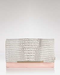 DIANE von FURSTENBERG's patent and embossed leather clutch is a cool girl's party plus one. Textured leather is on trend, while the shape is utterly revel-ready. DIANE von FURSTENBERG's patent and embossed leather clutch is a cool girl's party plus one. Textured leather is on trend, while the shape is utterly revel-ready.
