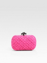 A demure bag of smooth woven leather, topped by a chic knotted clasp.Top clasp closureSuede lining7½W X 4¾H X 3/4DMade in Italy A demure bag of smooth woven leather, topped by a chic knotted clasp.Top clasp closureSuede lining7½W X 4¾H X 3/4DMade in Italy