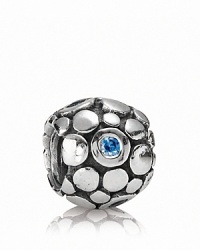 PANDORA's sterling silver pebbled bubble charm gets a blast of cool blue cubic zirconia sparkle. PANDORA's sterling silver pebbled bubble charm gets a blast of cool blue cubic zirconia sparkle.