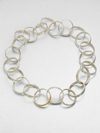 A beautiful link design with sleek sterling silver and radiant 24k gold concave rings. Sterling silver24k goldLength, about 23.6Slip-on styleImported A beautiful link design with sleek sterling silver and radiant 24k gold concave rings. Sterling silver24k goldLength, about 23.6Slip-on styleImported
