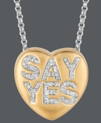 Ready to say your I do's? Sweethearts' adorable heart-shaped pendant expresses more that just great style with the words SAY YES spelled out in round-cut diamonds (1/6 ct. t.w.) across the surface. Pendant crafted in 14k gold over sterling silver and sterling silver. Copyright © 2011 New England Confectionery Company. Approximate length: 16 inches + 2-inch extender. Approximate drop: 5/8 inch. Ready to say your I do's? Sweethearts' adorable heart-shaped pendant expresses more that just great style with the words SAY YES spelled out in round-cut diamonds (1/6 ct. t.w.) across the surface. Pendant crafted in 14k gold over sterling silver and sterling silver. Copyright © 2011 New England Confectionery Company. Approximate length: 16 inches + 2-inch extender. Approximate drop: 5/8 inch.