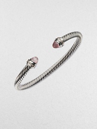 From the Cable Classics Collection. Two rose quartz cabochons accented with brilliant diamonds on a sterling silver cable design. Rose quartzDiamonds, .2 tcwSterling silverDiameter, about 2.5Imported From the Cable Classics Collection. Two rose quartz cabochons accented with brilliant diamonds on a sterling silver cable design. Rose quartzDiamonds, .2 tcwSterling silverDiameter, about 2.5Imported