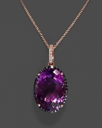 Amethyst pendant necklace with black and white diamonds in rose gold. Amethyst pendant necklace with black and white diamonds in rose gold.