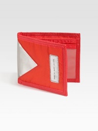 A slim and sporty essential for every casual man in bright, durable nylon. One bill compartment Three card slots, one ID window 5 X 3¾ Nylon Imported 