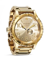 Nixon's gold-plated chronograph is designed to make an impact. This oversized watch epitomizes statement cool, a bomber jacket and dessert boots will finish a bold, masculine style. Nixon's gold-plated chronograph is designed to make an impact. This oversized watch epitomizes statement cool, a bomber jacket and dessert boots will finish a bold, masculine style.
