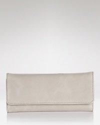 Hobo's luxe leather wallet is a smooth cash stasher with an smartphone pocket to boot. The cool compact keeps your essentials close, in your day bag or as a cocktail-ready clutch. Hobo's luxe leather wallet is a smooth cash stasher with an smartphone pocket to boot. The cool compact keeps your essentials close, in your day bag or as a cocktail-ready clutch.