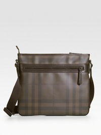 A slim-line urban case for the man on the go, shaded with iconic checks and crafted with durable, long-lasting wear.Adjustable crossbody strapZip closureExterior zip pocket13½W X 12½H X 1DPVCMade in Italy A slim-line urban case for the man on the go, shaded with iconic checks and crafted with durable, long-lasting wear.Adjustable crossbody strapZip closureExterior zip pocket13½W X 12½H X 1DPVCMade in Italy