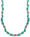 Grace your seasonal looks with this illusion necklace by Lauren by Ralph Lauren. Vibrant semi-precious turquoise nuggets blend with silver tone metal beads in a setting of antiqued silver tone mixed metal. Approximate length: 30 inches.