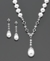 Smooth style that raises the bar. This gorgeous pendant and earring set features cultured freshwater pearls (5-9 mm) set in sterling silver. Pendant measures approximately 15 inches with a 2-inch drop. Earrings measure approximately 3/4 inch.