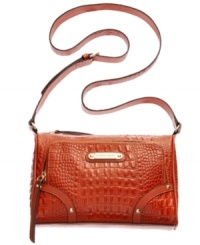 Create a commotion with this sleek, croc-embossed design from Franco Sarto. Ultra-soft leather is accented with signature golden hardware, while the pocket-lined interior easily stashes your daytime essentials. Create a commotion with this sleek, croc-embossed design from Franco Sarto. Ultra-soft leather is accented with signature golden hardware, while the pocket-lined interior easily stashes your daytime essentials.