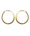 Hammered hoops make every day edgier. Kenneth Cole New York reinvents a classic with iridescent goldtone mixed metal and crystal accents. Approximate diameter: 3/4 inch.