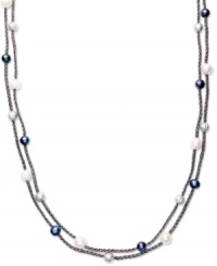 True treasures of the deep, cultured freshwater pearls (8-10 mm) make a strong statement upon intricately woven black polyester and metallic threads in this stunning necklace. Long enough to wrap twice to create added volume. Approximate length: 64 inches. True treasures of the deep, cultured freshwater pearls (8-10 mm) make a strong statement upon intricately woven black polyester and metallic threads in this stunning necklace. Long enough to wrap twice to create added volume. Approximate length: 64 inches.