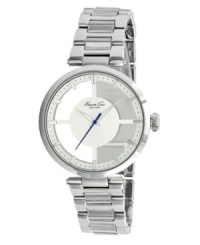 Crystal clear style. Kenneth Cole New York fashions this watch with a uniquely translucent case. Stainless steel bracelet and translucent case with silver tone bezel. White dial features applied silver tone stick indices, printed minute track, logo, hour and minute hands, and blue second hand. Quartz movement. Water resistant to 30 meters. Limited lifetime warranty. Crystal clear style. Kenneth Cole New York fashions this watch with a uniquely translucent case. Stainless steel bracelet and translucent case with silver tone bezel. White dial features applied silver tone stick indices, printed minute track, logo, hour and minute hands, and blue second hand. Quartz movement. Water resistant to 30 meters. Limited lifetime warranty.