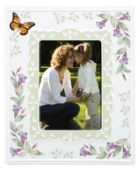 Spring is perpetually in season with whimsical Butterfly Meadow giftware. Colorful blooms and a playful butterfly mingle on this white porcelain picture frame, creating an extra-sweet scene for precious memories. Spring is perpetually in season with whimsical Butterfly Meadow giftware. Colorful blooms and a playful butterfly mingle on this white porcelain picture frame, creating an extra-sweet scene for precious memories.