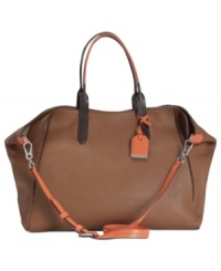 Classic with a contemporary attitude, this season's essential silhouette from Cole Haan is always on-trend. With buttery-soft leather, gleaming hardware and generous interior, it's easy to understand why this carryall is so coveted. Classic with a contemporary attitude, this season's essential silhouette from Cole Haan is always on-trend. With buttery-soft leather, gleaming hardware and generous interior, it's easy to understand why this carryall is so coveted.