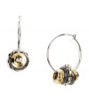 Not your average hoops. This versatile Nine West style highlights metallic discs in silver tone, gold tone, and hematite tone mixed metal that will match effortlessly with your other jewelry styles. Crafted in mixed metal. Approximate drop; 1-3/4 inches. Approximate diameter: 1-1/4 inches.