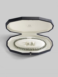 From the South Sea Collection. A gorgeous strand of graduated black cultured pearls set in 18k white gold and pearl stud earrings to match, for a gift set that makes a lasting impression. Presented in elegant oyster-shaped box. Necklace:8mm-10mm black round cultured pearls Quality: A+ 18k white gold Length, about 18 Mikimoto signature clasp ImportedEarrings:9mm black round cultured pearls Quality: A+ 18k white gold Post back Imported From the South Sea Collection. A gorgeous strand of graduated black cultured pearls set in 18k white gold and pearl stud earrings to match, for a gift set that makes a lasting impression. Presented in elegant oyster-shaped box. Necklace:8mm-10mm black round cultured pearls Quality: A+ 18k white gold Length, about 18 Mikimoto signature clasp ImportedEarrings:9mm black round cultured pearls Quality: A+ 18k white gold Post back Imported