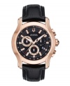 Showcase your standard for excellence with this handsome Stratford collection watch by Bulova Accutron. Black croc-embossed leather strap and round rose gold tone stainless steel case with curved sapphire crystal. Black chronograph dial features tachymeter scale, rose gold tone stick indices, minute track, date window at four o'clock, three subdials, luminous hands and logo. Swiss quartz movement. Water resistant to 50 meters. Five-year limited warranty.