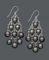 Nothing says elegance like pearls. Pretty cultured Tahitian pearls (7-8 mm) combine with sterling silver to create a polished pair of chandelier earrings, perfect for day or night. Approximate drop: 2-1/2 inches.