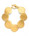 Add luminosity to your look with rich gold tones. Bracelet from the Lauren by Ralph Lauren collection features textured potato chip links with a chic toggle clasp. Crafted in gold tone mixed metal. Approximate length: 7-1/2 inches.