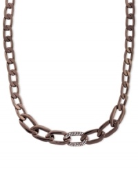 Chocolate treat. This necklace from Vince Camuto, crafted from chocolate tone mixed metal, features a clear pave link at the center of the chain. Approximate length: 16 inches. Chocolate treat. This necklace from Vince Camuto, crafted from chocolate tone mixed metal, features a clear pave link at the center of the chain. Approximate length: 16 inches.