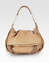 Sleek modern chains adorn this slouchy carryall made of butter-soft Italian leather. Adjustable shoulder strap, 9-23 dropFold-over top zip closureOne open compartment under flap with zip pocketOne inside zip pocketSuede lining15½W X 12H X 5DMade in Italy
