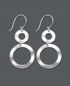 Simple shapes make a sublime statement in these pretty dangle earrings by Studio Silver. Two cut-out, graduated circles shine in polished sterling silver. Approximate drop: 1-1/2 inches.