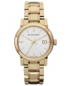 Structured stainless steel gets romanticized with golden hues on this Burberry watch.