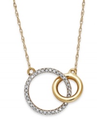 Slightly asymmetrical with a touch of shimmer, this double circle pendant embodies contemporary style. Crafted in 10k gold with sparkling round-cut diamonds adorning the larger circle. Approximate length: 17-1/2 inches. Approximate drop: 1/2 inch. Slightly asymmetrical with a touch of shimmer, this double circle pendant embodies contemporary style. Crafted in 10k gold with sparkling round-cut diamonds adorning the larger circle. Approximate length: 17-1/2 inches. Approximate drop: 1/2 inch.