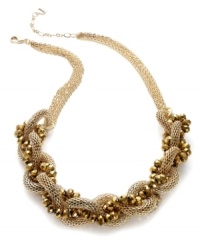 Wrap your neckline in bohemian beauty. This Alfani necklace features a twisted silhouette with 12k gold-plated mixed metal mesh and faceted beads. Approximate length: 18 inches + 3-inch extender. Wrap your neckline in bohemian beauty. This Alfani necklace features a twisted silhouette with 12k gold-plated mixed metal mesh and faceted beads. Approximate length: 18 inches + 3-inch extender.
